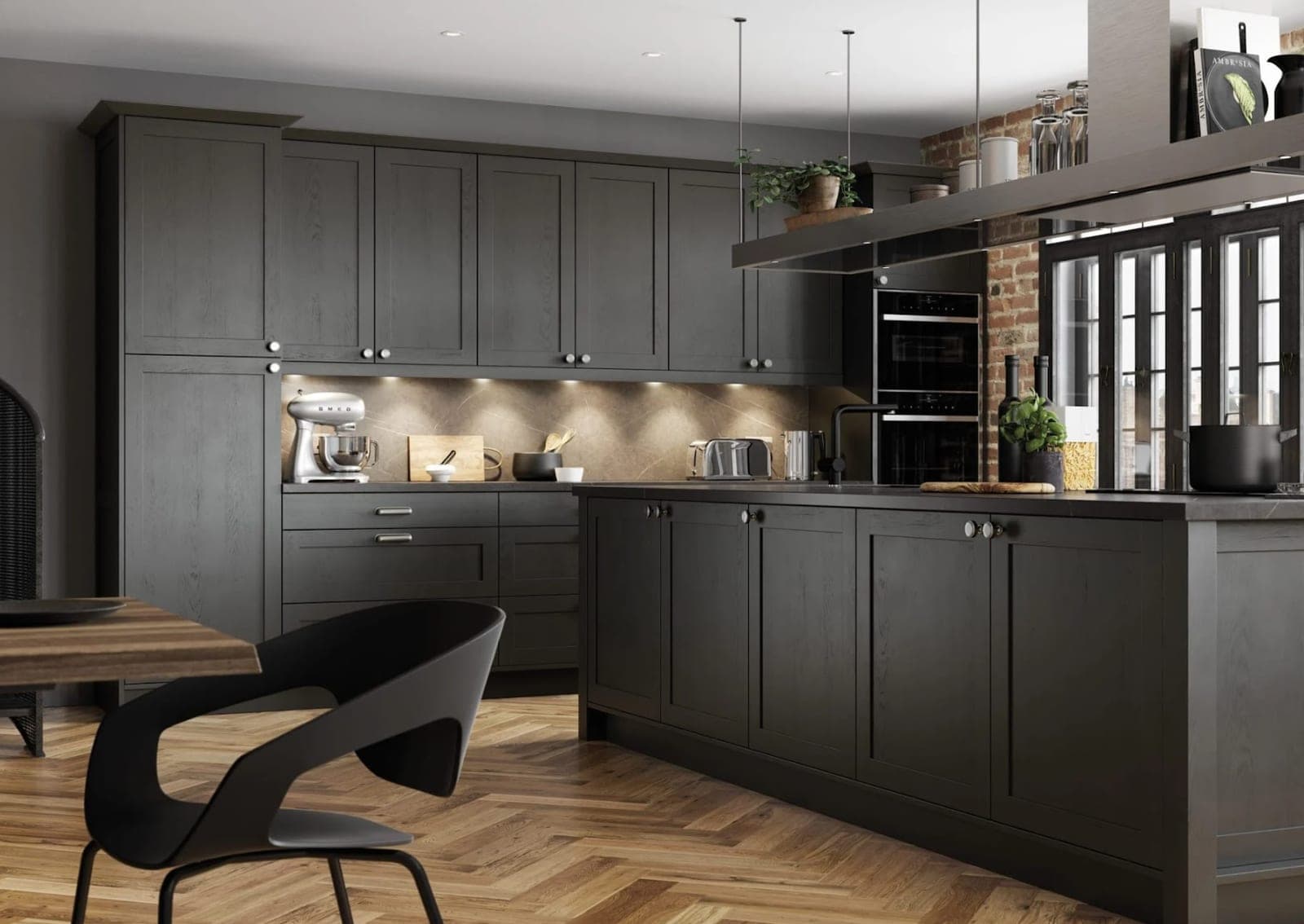 Charcoal shaker kitchen with exposed brick wall, herringbone floor, and brushed-steel hardware
